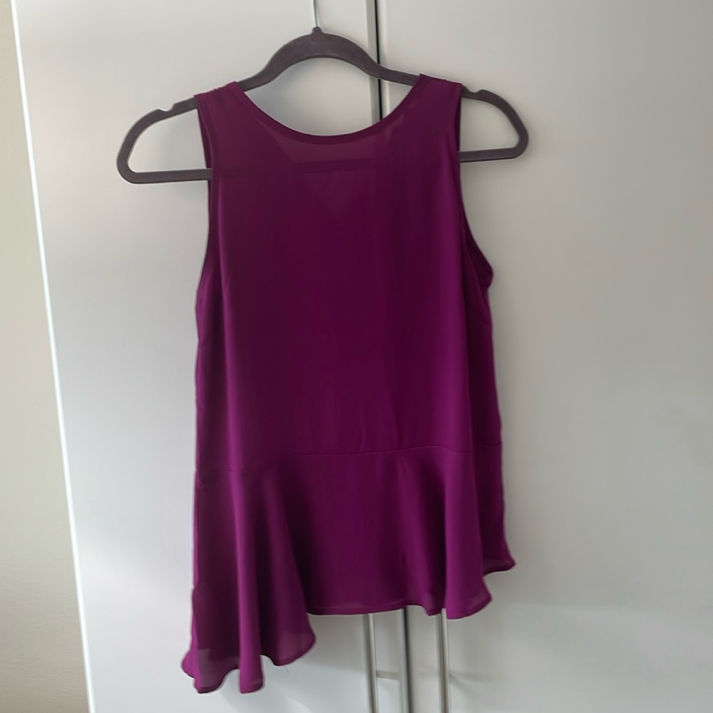Fuchsia sleeveless asymmetrical tunic top in xsmall. Brand new with tags!